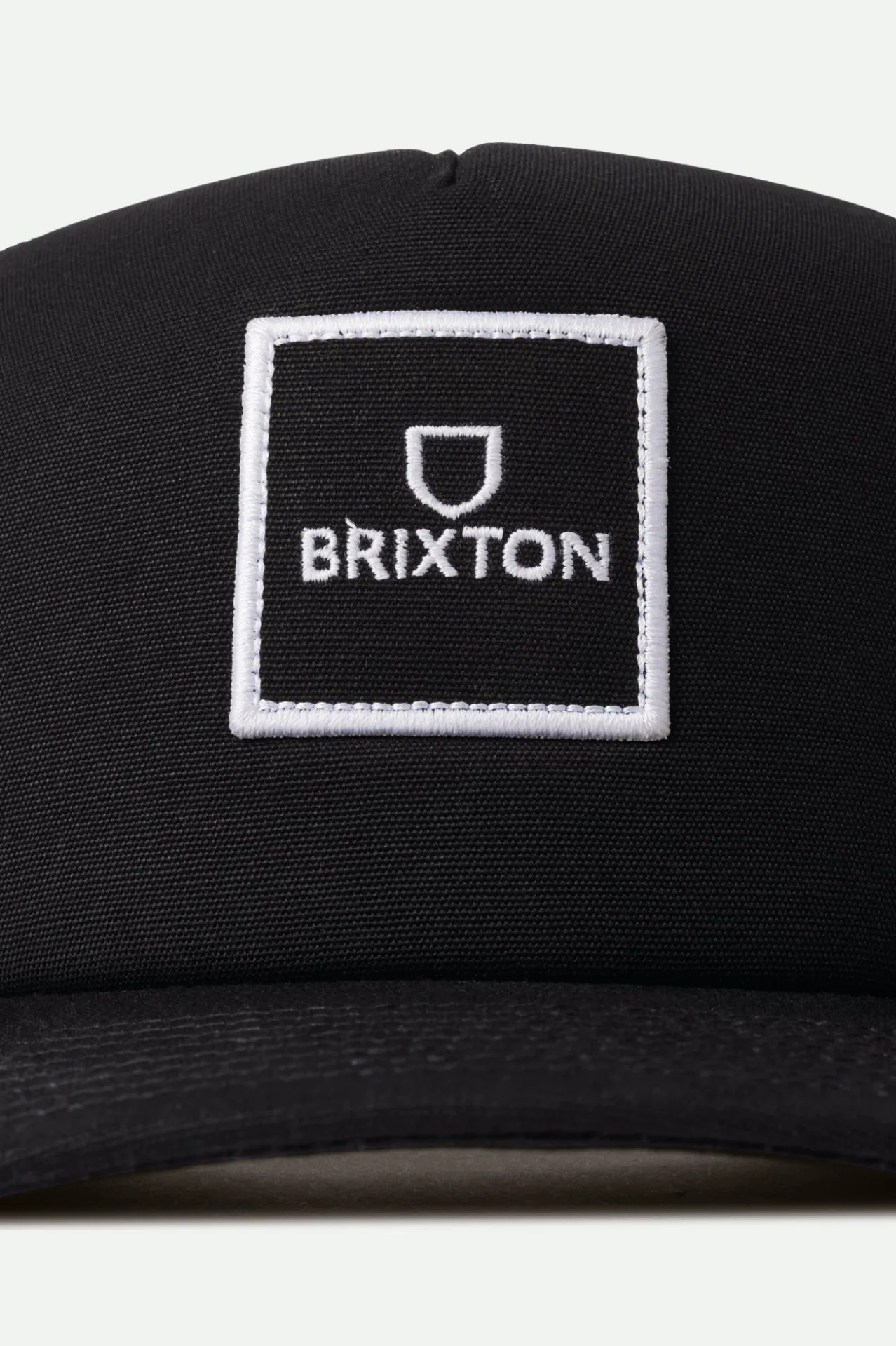 Alpha Block NetPlus Trucker Hat